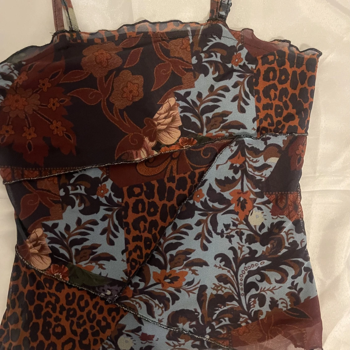 Mönstrat fodrat meshlinne i strl S - 90