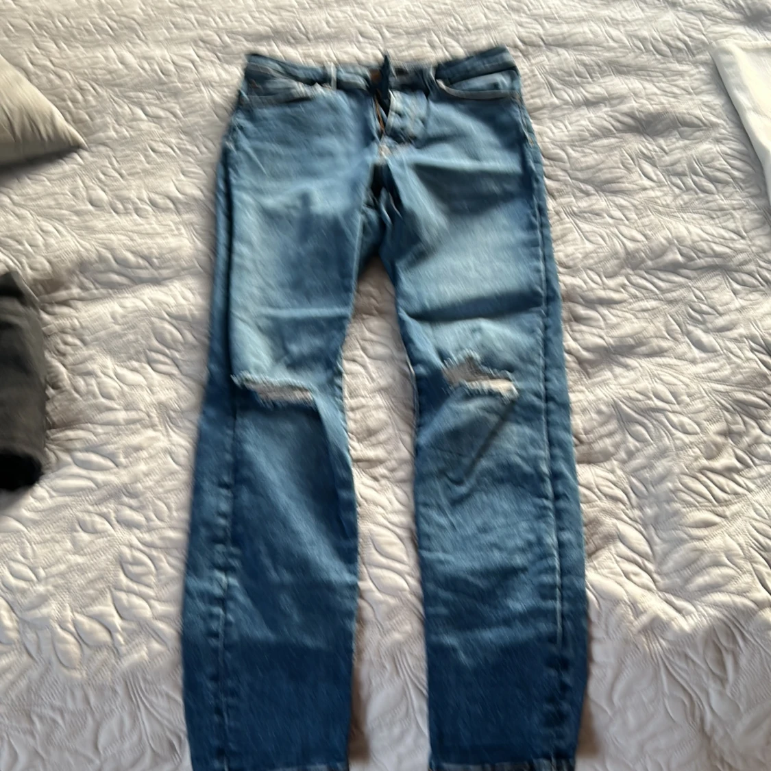 Ett par blåa jeans  - 90