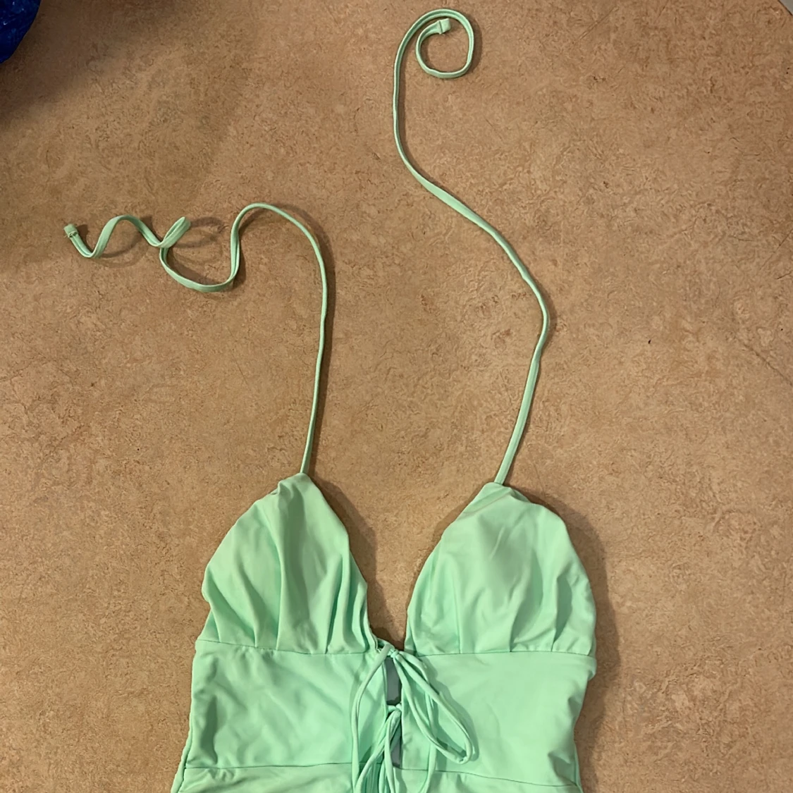 Oanvänd baddräkt  - 90