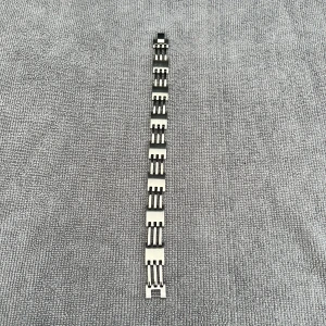 Rostfritt armband - Nytt rostfritt metallarmband i trendig design. Storlek: 22 cm. Köparen står för frakt.