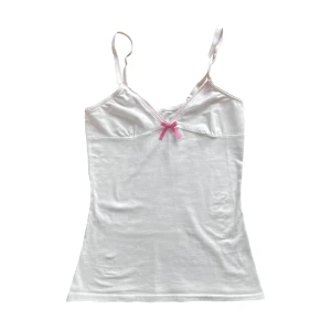 Linne - Gulligt linne med rosettdetalj, köpt second hand men är i mycket bra skick 🎀 