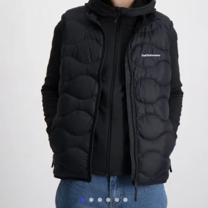 peak väst - bild från internet.  säljer västen då den ej används längre, kan går ner i pris vid snabb affär. 