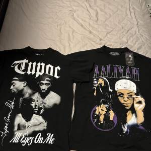 Tupac t-shirten är använd men fortfarande schysst 80kr storlek xs. Aaliyah tröjan är köpt i Spanien och är helt oanvänd storlek S 100 kr. Säljer båda för 150