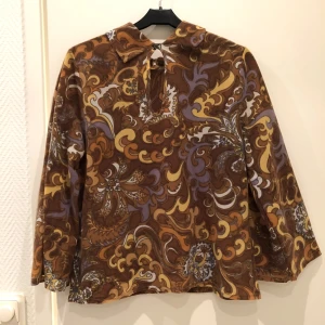 70-talstopp med retro mönster - Mjukt, lite fluffigt men tunt material