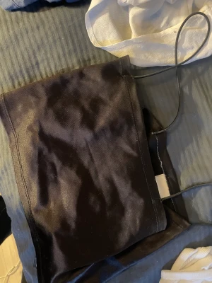 Glansigt linne - Glansigt linne som sitter som xs