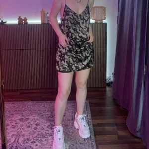 Military print silky dress - Military print dress in a silky feeling material, black underdress, good quality, Short/mid length, adjustable straps