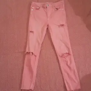(size 32) hot pink ripped jeans