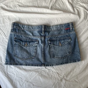 Minikjol - Miniskirt i storlek 42, aldrig använd