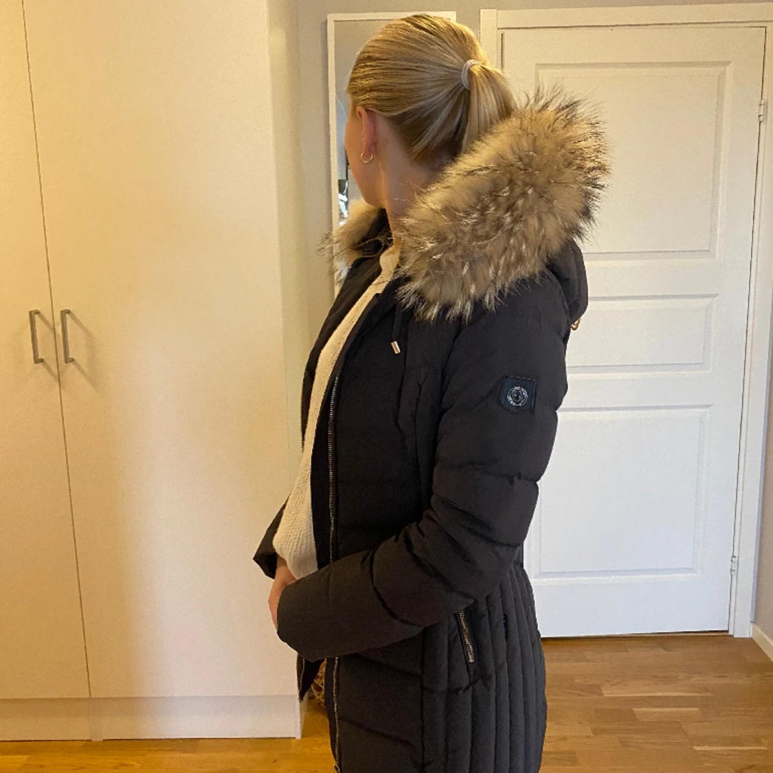 Vinterjacka med pälsluva