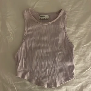 Lila topp - Skriv för bild på