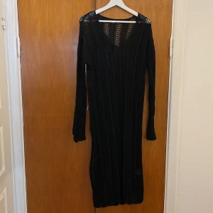 Strandkklänning - Stickad strandklänning, inte ancänd. 