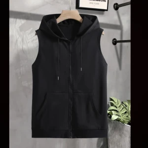 Kofta utan armar från SHIEN  - En väldigt fin kofta utan armar. Första bilden är från SHIEN och det ända som inte stämmer är att den koftan jag säljer har en silvrig dragkedja inte svart