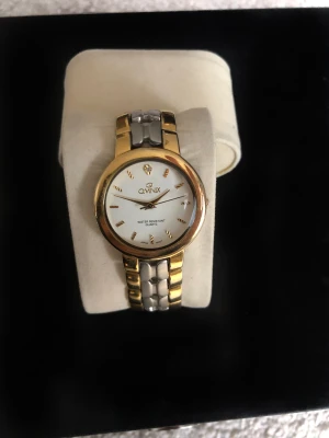 Klocka guld / silver - Klocka med en blandning av guld och silver 