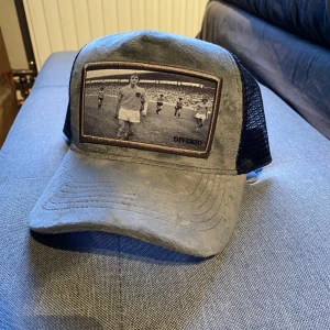 Diverzo keps - Diverzo keps med Johan Cruyff bild. Aldrig använd.   Nypris 500