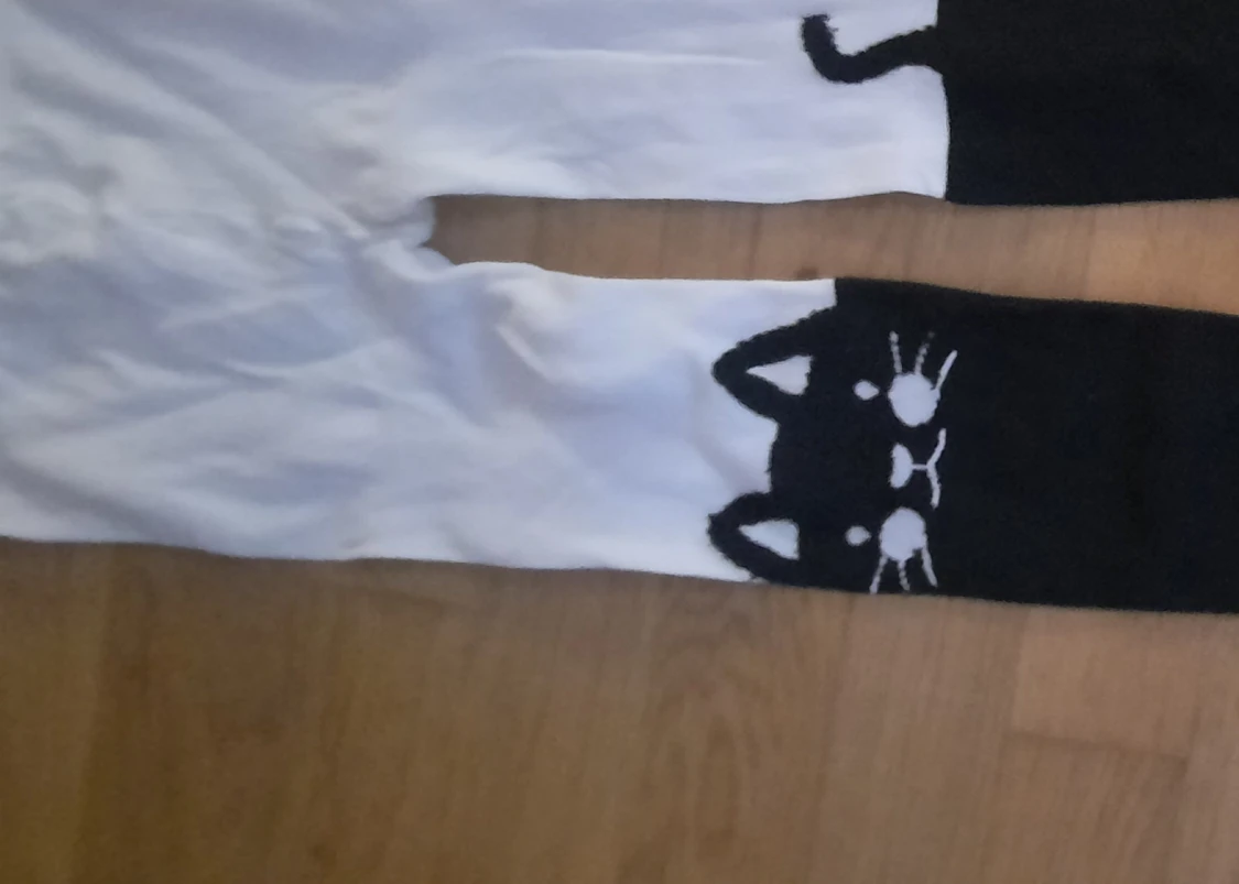 Oanvända strumpbyxor med katt - 91
