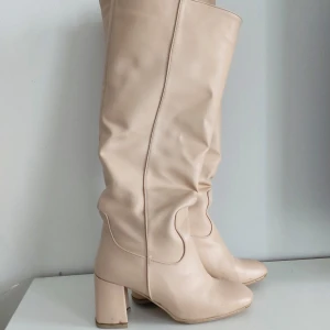 Boots 37 - the boots have a little damage visible in the picture