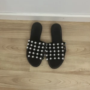 Svarta sandaler - Använd några gånger 