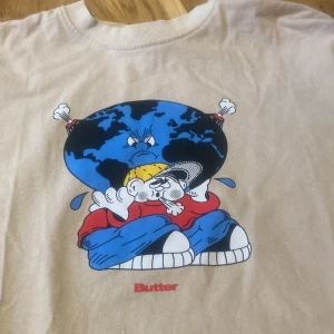 Butter T-shirt stolen M - Jättefint skick. Sparsamt använd