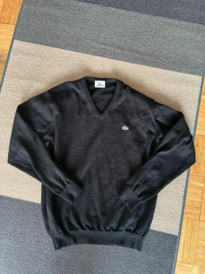 Lacoste V Neck Vintage Sweater - Authentic vintage Lacoste V-neck sweater. 100% virgin wool (Woolmark) and made in France (Devlay). Size M / 4. Very good condition!