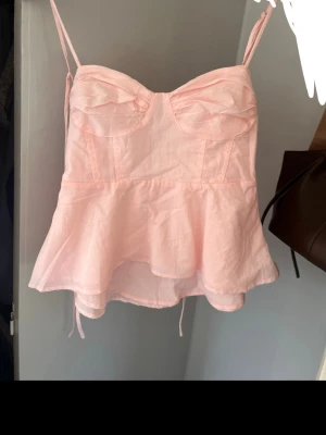 rosa topp - söt rosa topp i strlk xs aldrig använd 