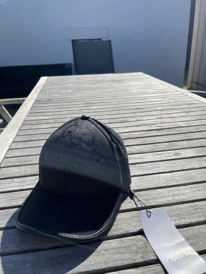 Svart helt vanlig keps - Jätte bra kvalitet inget fel på den