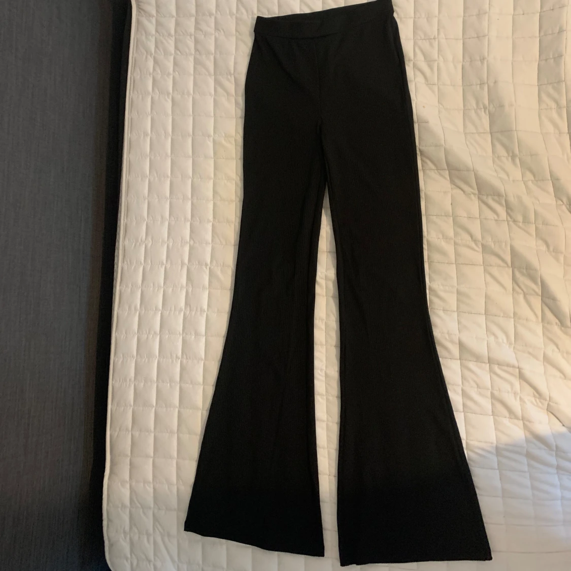 Svarta tygbyxor, storlek xs