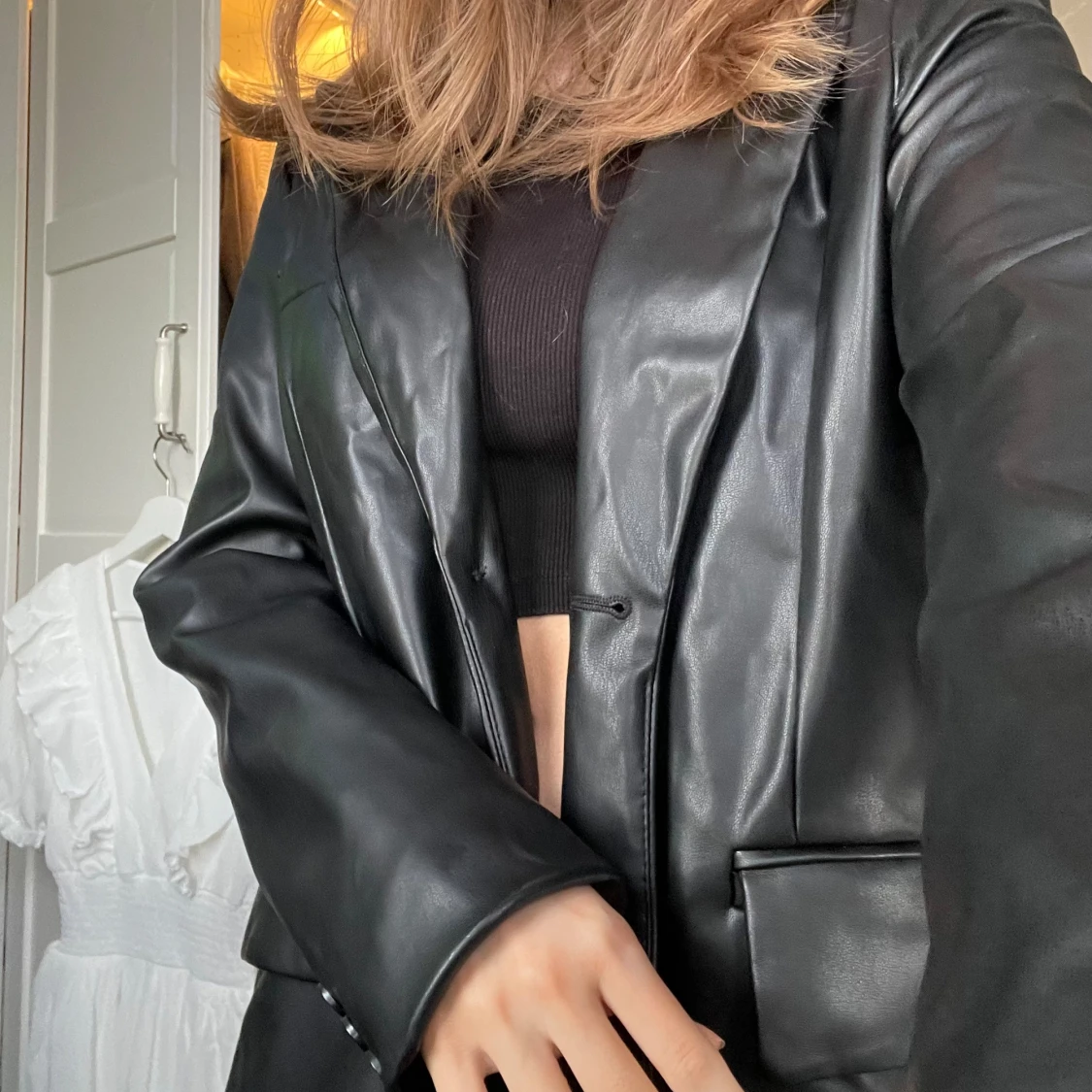 Svart kavaj i fejkläder