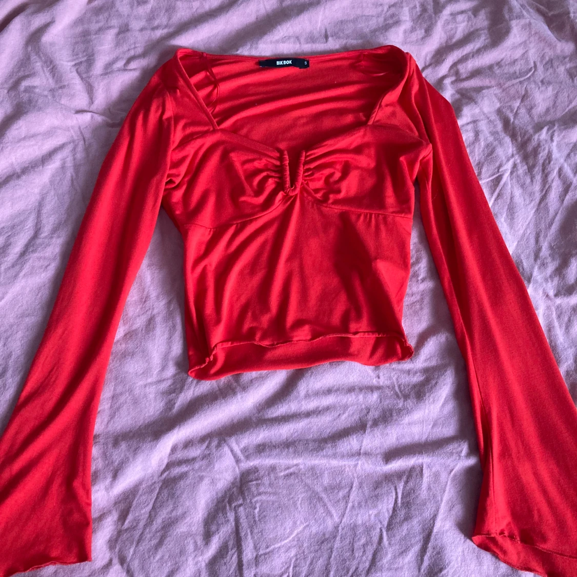 Röd långärmad tröja