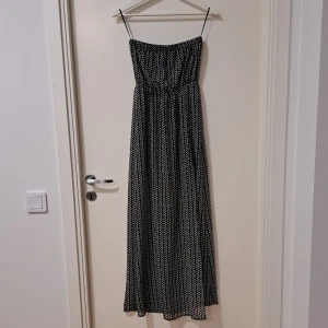 Klänning  - Storlek 34