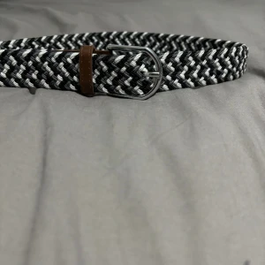 Flätat bälte - Flätat bälte 105cm Grå,svart,vit