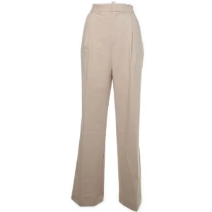 Kostymbyxor  - Beige kostymbyxor som inte kommer till användning längre 