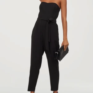 Jumpsuit i st 34  - I jätte bra skick 