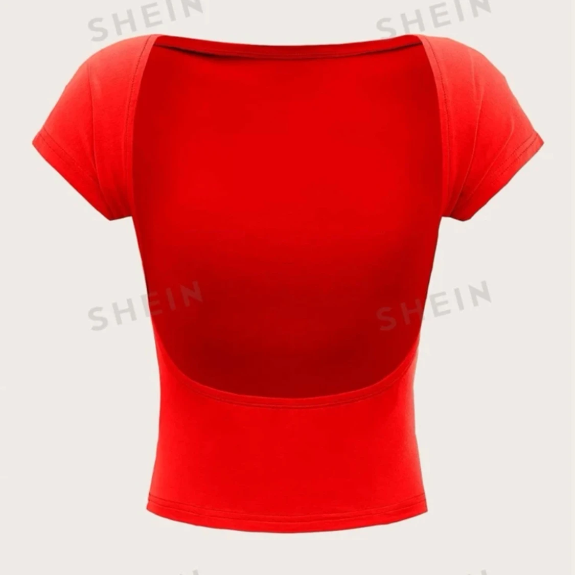 Rygglös röd tröja! 