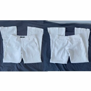 vita kostymbyxor med slits - vita lågmidjade kostymbyxor med slits från Bik Bok! fint skick! storlek 34 (ytterben ca 87cm, innerben ca 70cm). kontakta mig om du har frågor <3