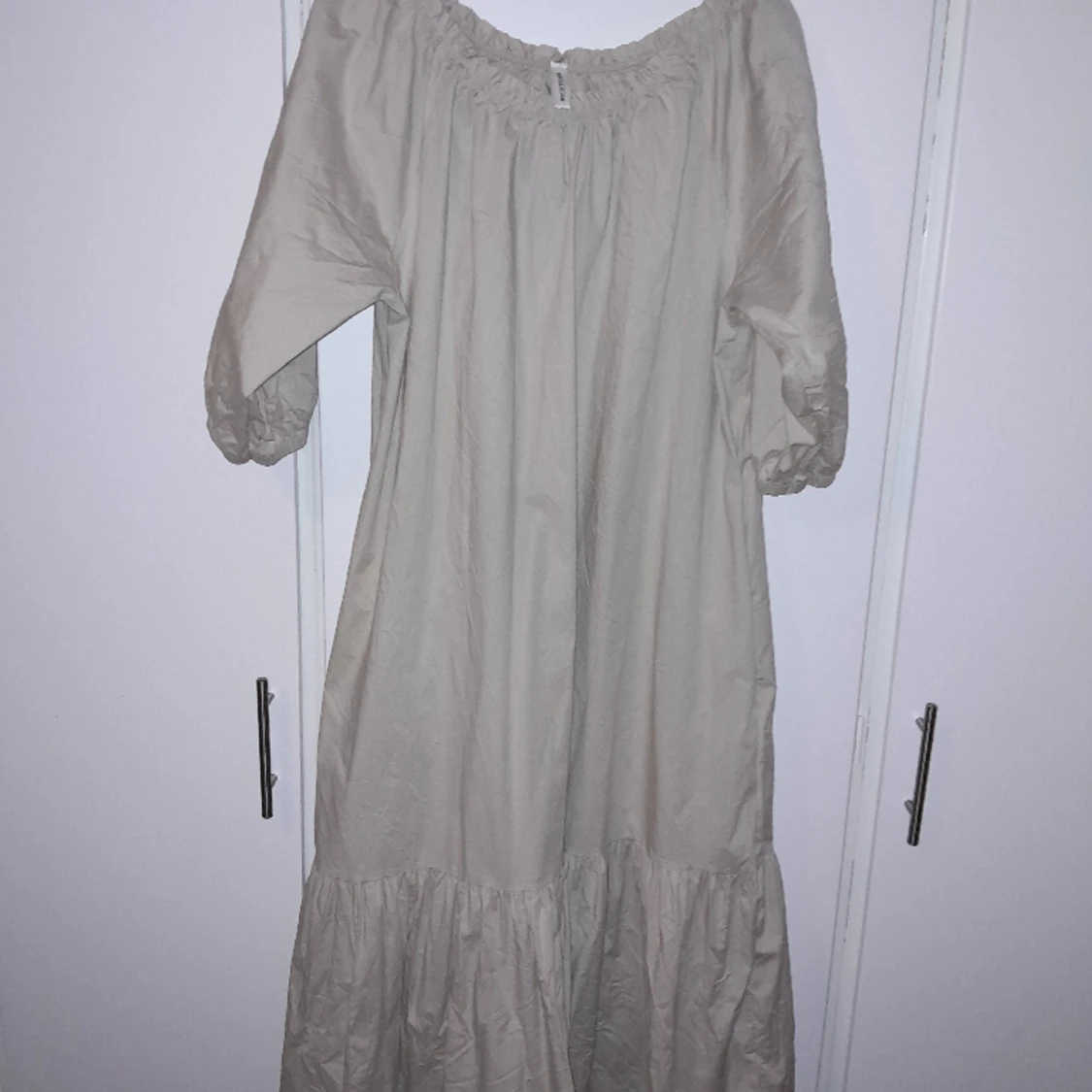 Beige klänning Storlek M