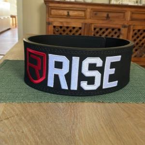 Rise tyngdlyftarbälte - Nypris 1200kr exklusive frakt från Usa/Canada. 10mm och 4 inches bred 