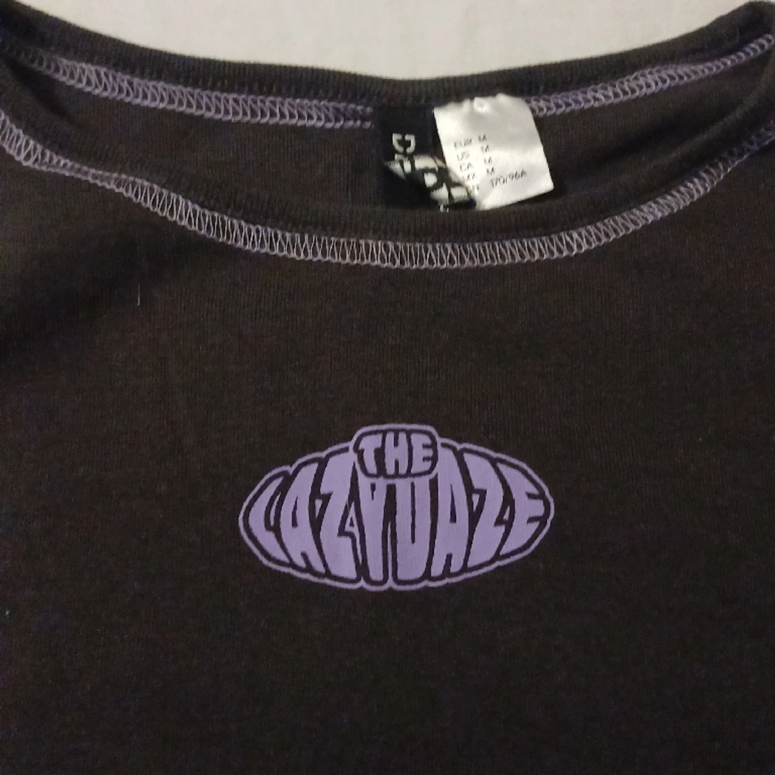 Svart Magtröja med lila mönster  - 91