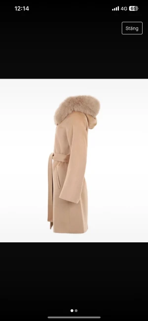 Kappa från hollies  - Använd ett fåtal gånger   Finns i ett djur och rökfritt hem 