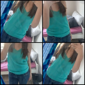 Blått/grönt linne - det är ett blått/grönt linne, köpte den ifrån london (primark) kommer inte ihåg original priset men någon stans mellan 100/150. 