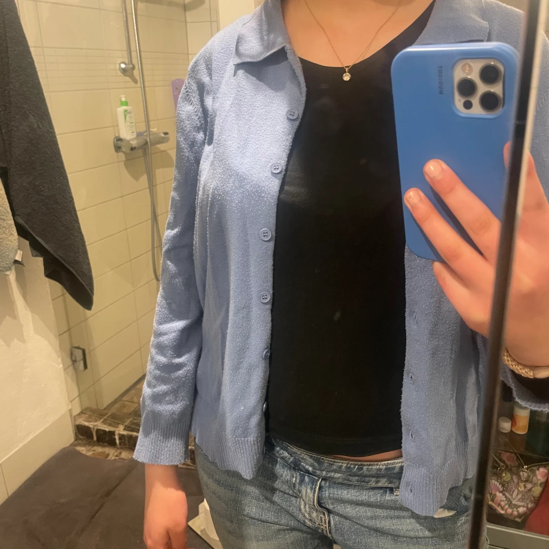 Blå kofta med knappar - 91