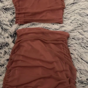 Sett  - Jätte fint Baby rosa sett, man får verkligen en jätte fin kroppsform! Toppen är dock lite för kort.