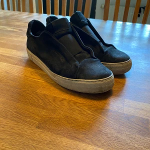 Axel arigato leceless - Dom är i använt skick