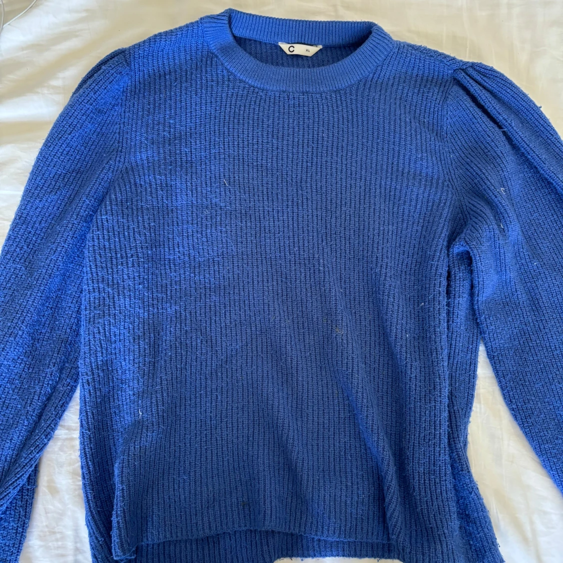 Blå stickad tröja