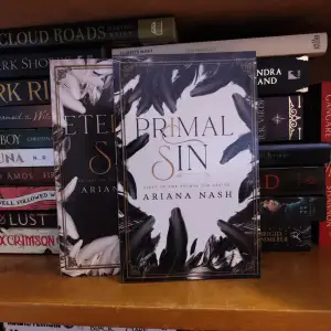 Bok 1&2 i serien 'Primal sin' skriven av Ariana Nash. Nyskick