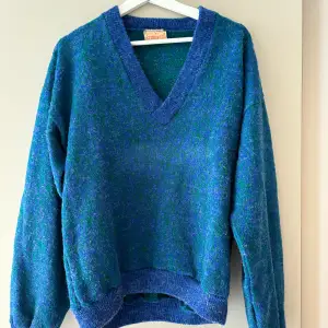 Stickad oversized tröja från Starmount, storlek M. En blågrön färg.
