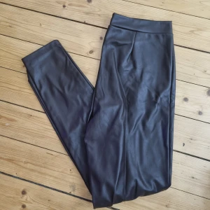 Mörkbruna skinnbyxor  - Använda fåtal ggr.