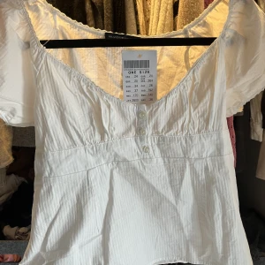 Supergullig topp  - Jättegullig topp ifrån brandy. Lite stor på mig så aldrig använt 🥰
