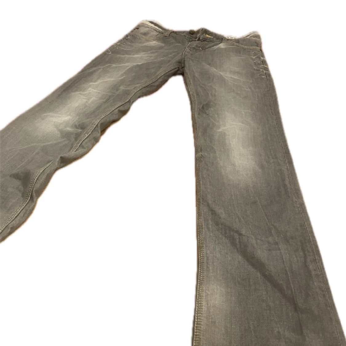 Gråa utsvängda jeans  - 90