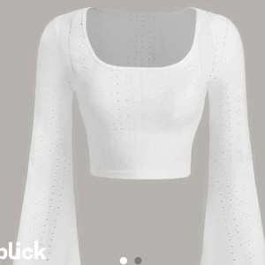 Topp - Topp med trumpet ärmar 