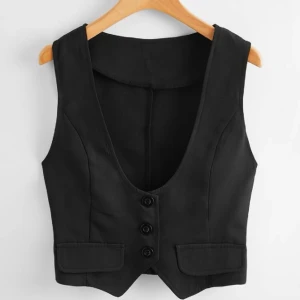 svart väst - svart väst i storlek 36 men sitter löst. Aldrig använd och i perfekt skick